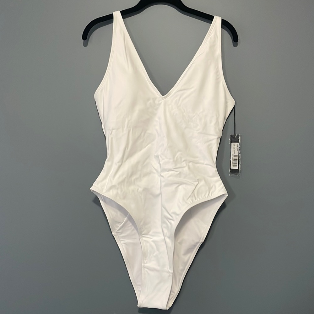 TA3 swimsuit - new with tags!  Hi cut plungey size L regular/large.